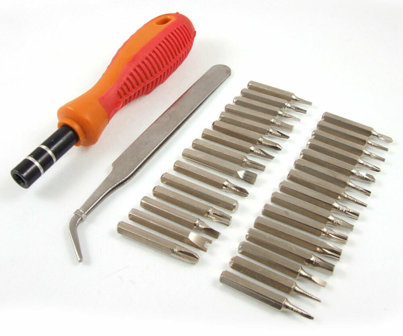 Screwdriver with extensive collection of driver tips.